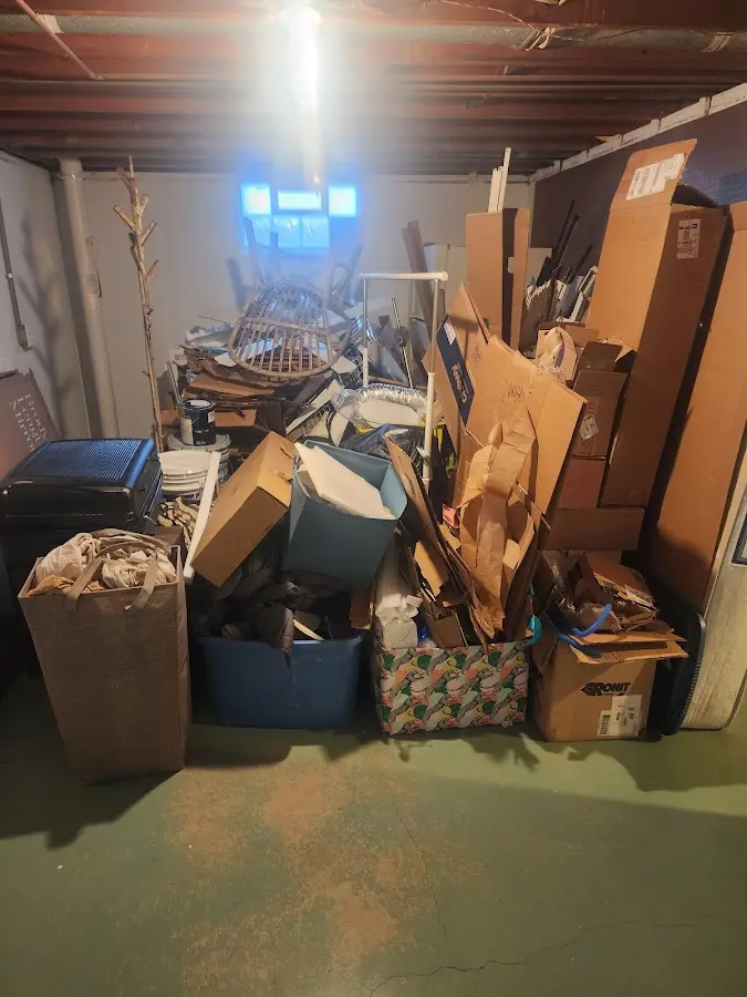 Roll-off dumpster container at job site for 6 Yard Dumpster Rental in Greenfield